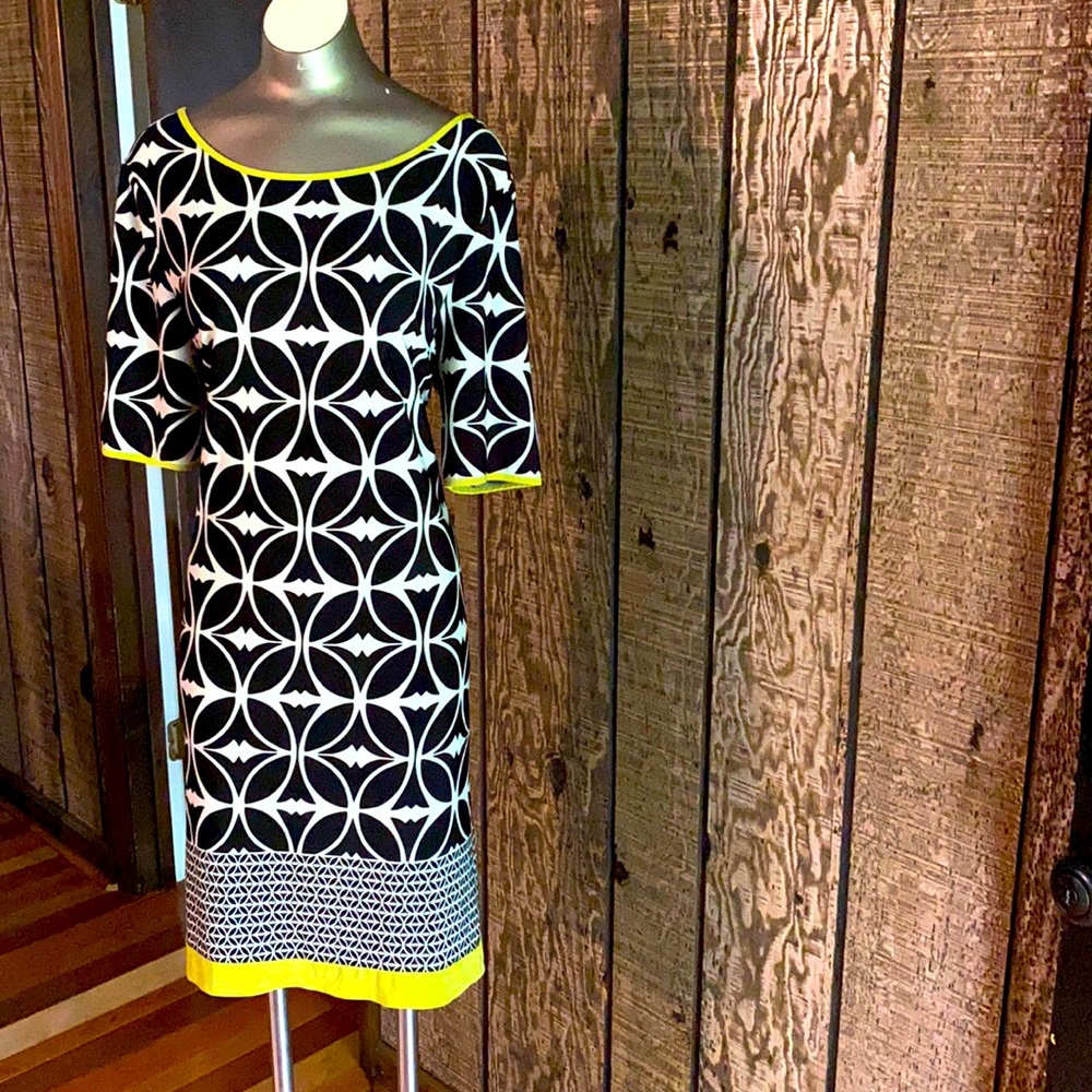 Black and white dress, trimmed in neon green